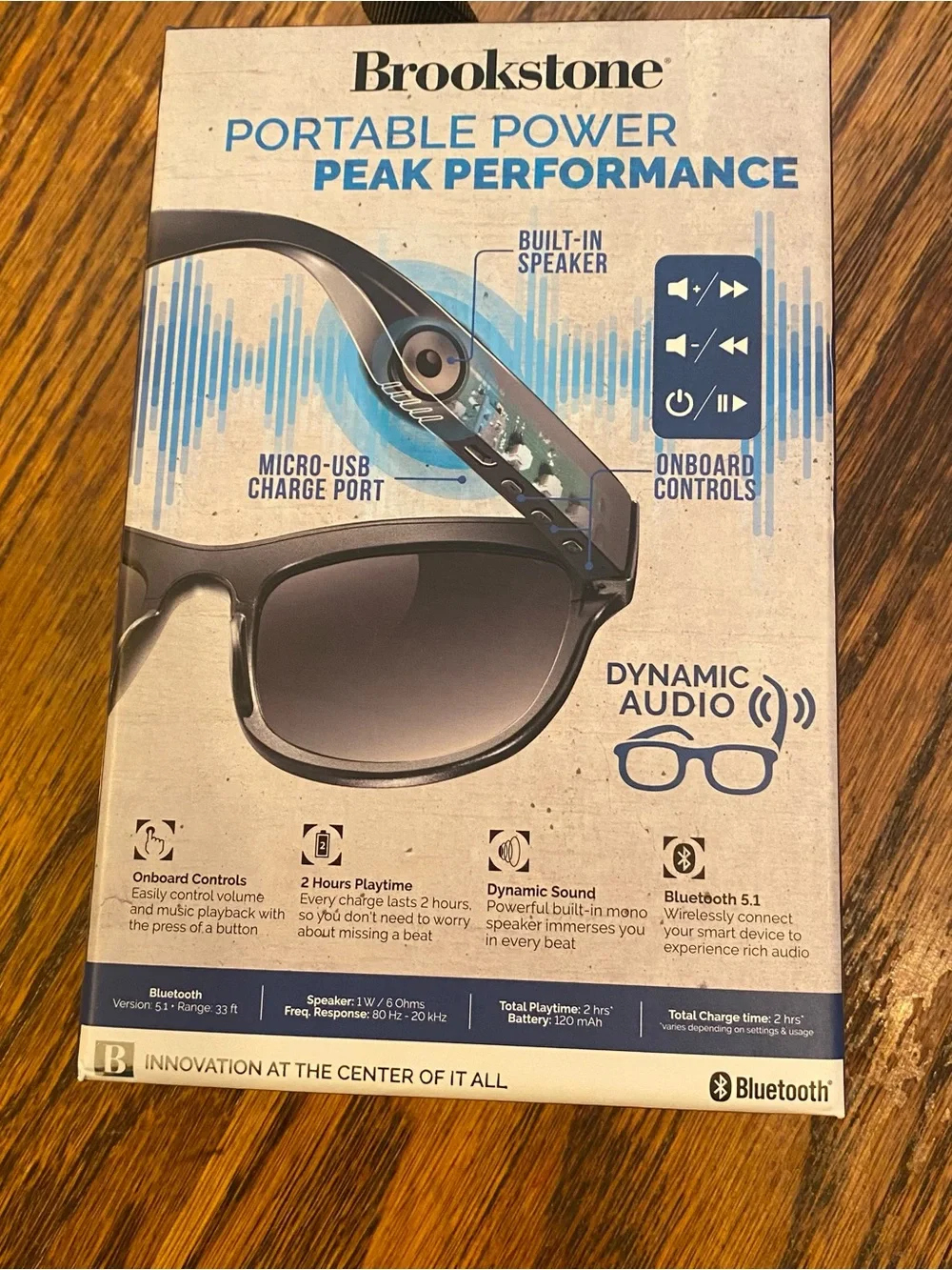 Brookstone Portable Power Dynamic Audio Sunglasses in Black and Blue